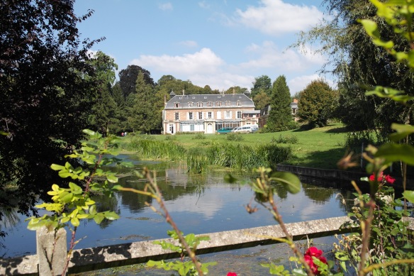 The view of Chateau Beaufresne from the back of the property, across a lovely little lilly pond.